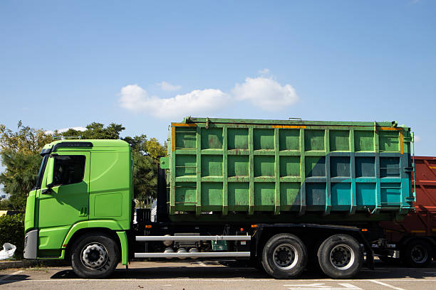 this is a truck that collects garbage. .